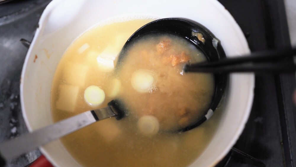 add the dissolved miso paste to the pot