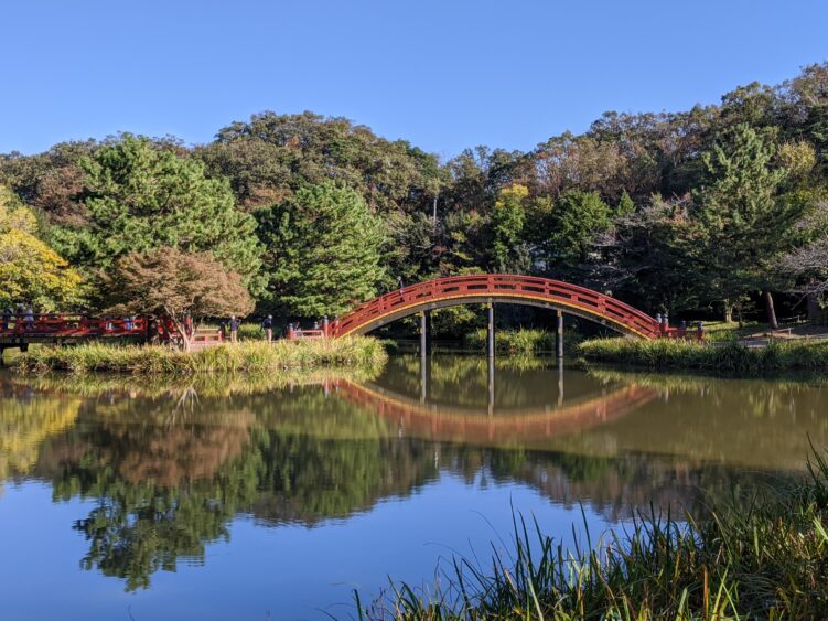 A red bridge makes serene environment